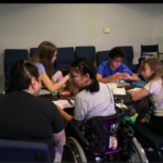 Students and instructors working together backstage at JDS Creative Academy