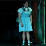 Students performing on stage at JDS Creative Academy, learning teamwork, confidence, and life skills through theater education.