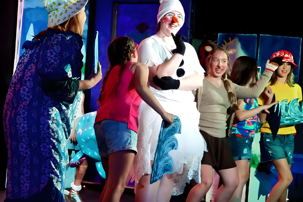 Students performing, filming, or editing projects at JDS Creative Academy showcasing hands-on learning and creativity