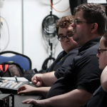 Student presenting a film project to a mentor panel at DigiFest Temecula