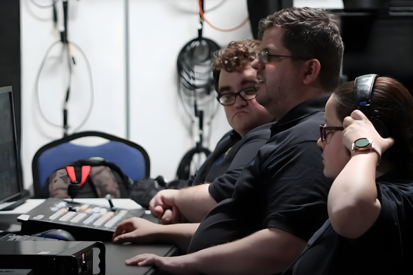 Student presenting a film project to a mentor panel at DigiFest Temecula